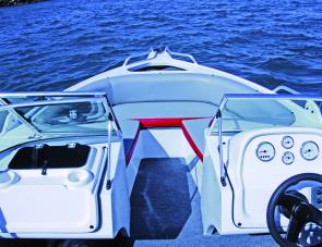 Twin modules for skipper and mate are a feature of this nifty bow rider. The comfy bow rider seating up front makes a handy area to fish.
